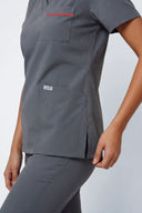 Pocket and seam details on the Smoky Grey ST247 Scrub Top from the side