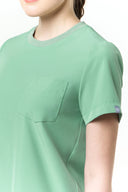 Pocket, neckline and seam details on the Smoke Mint CST201 Scrub Top