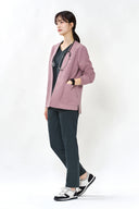 Model wearing Charcoal ST002 Scrub Top and Over-scrub by Good Uniform, full front view