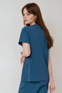 Side and back fit of the Methyl Blue ST215 Scrub Top by Good Uniform