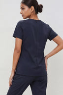 Side and back fit of the Dark Navy Anyone Zip Scrub Top by Good Uniform