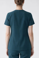 Back fit of the Antique Blue Anyone Zip Scrub Top by Good Uniform