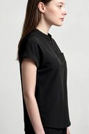 Side and back fit of the Jet Black CST202 Scrub Top by Good Uniform