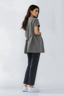 Side and back fit of the Mild Grey NF30 Maternity Scrub Top by Good Uniform, full shot