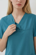 Neckline and button details on the Aquamarine ST215 Scrub Top