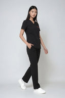Side fit of the Black ST247 Scrub Top by Good Uniform full shot