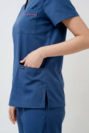 Pocket details on the Methyl Blue ST247 Scrub Top from the side