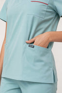 Pocket details on the Mint Haze ST247 Scrub Top