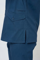 Pocket  details on the Matte Blue Avison Scrub Top from the side