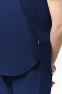 Side seam details on the Warm Navy CST201 Scrub Top