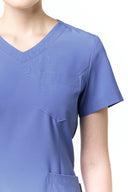 Pocket, neckline and seam details on the Lavender Blue CST203 Scrub Top