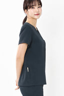 Side fit of the Charcoal ST002 Scrub Top by Good Uniform showing pen sleeve detail