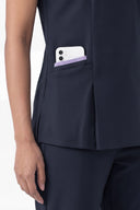 Pocket details on the Dark Navy Anyone Zip Scrub Top from the side