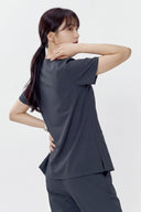 Side and back fit of the Cool Grey ST215 Scrub Top by Good Uniform