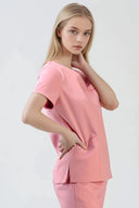 Side fit of the Indi Pink ST247 Scrub Top by Good Uniform