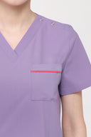 Pocket, neckline and shoulder details on the Lavandula ST247 Scrub Top