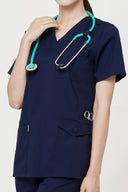 Pocket, neckline and shoulder details on the Modern Navy Avison Scrub Top