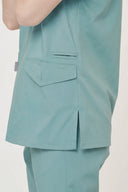 Side pocket and seam details on the Vintage Mint Avison Scrub Top