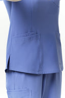 Pocket and side slit details on the Lavender Blue CST203 Scrub Top
