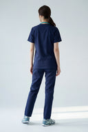 Back fit of the Modern Navy Avison Scrub Top by Good Uniform in full view