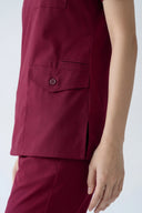 Pocket details on the Rosé Wine Avison Scrub Top from the side