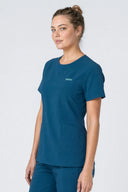 Side fit of the Blue Green Mild280 Zip Scrub Top by Good Uniform