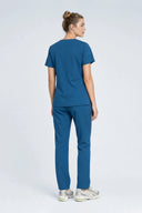 Back fit of the Blue Green Mild280 Zip Scrub Top by Good Uniform